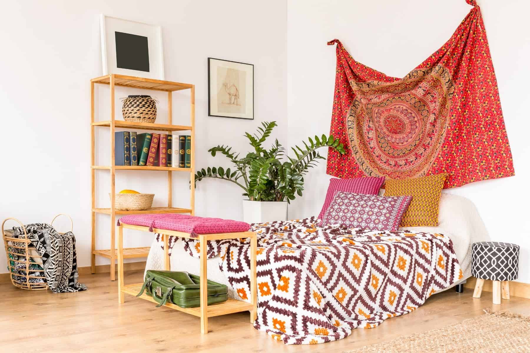 Boho style textiles in bedroom.